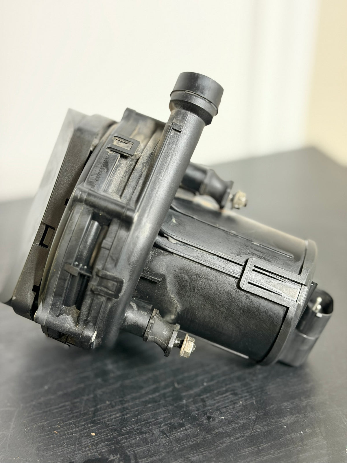 Secondary air injection pump - front motor housing view